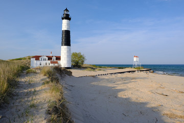 Fototapeta na wymiar Big Sable Point Lighthouse in dunes, built in 1867