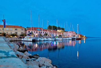 Fototapeta na wymiar Sali village harbor evening view