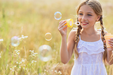 Cute kid having fun in nature
