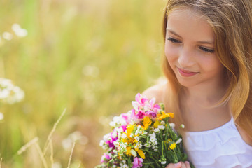 Pretty kid dreaming in nature