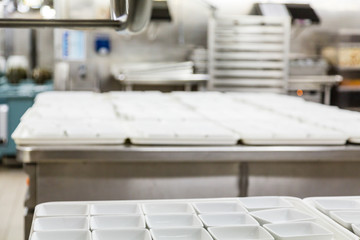 Obraz na płótnie Canvas Rows of Empty Dishes Ready for Food