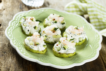 Shrimp appetizer with chili pepper, zucchini and cottage cheese