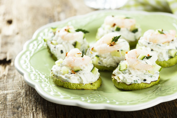 Shrimp appetizer with chili pepper, zucchini and cottage cheese