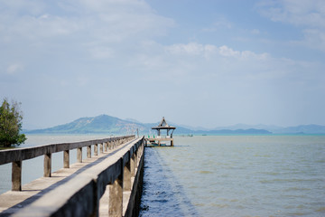 Obraz premium Beautiful old pier on the sea shore.