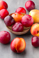 Fresh fruit on the gray background.