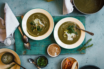 Tenderstem broccolli and kale cabbage leaves cream soup with cheese and seeds. 
