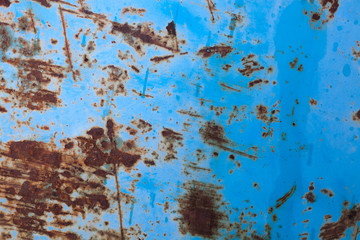 Fondo de puerta metálica azul. Textura de metal oxidado. / Blue rusted metal background