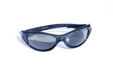 Black sunglasses for men on isolated white background. Occhiali da sole neri da uomo sfondo bianco
