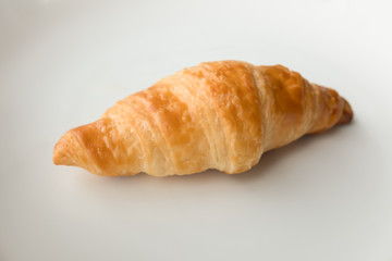Croissant on white background