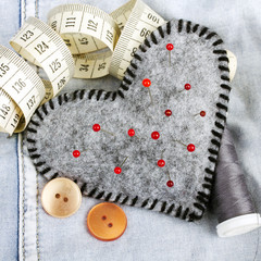 Heart shaped pincushion and tailor accessories
