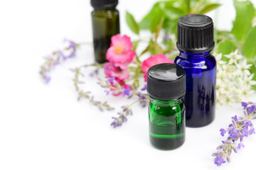 essential oils with herbal flowers