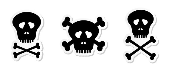 Set stickers black white human skulls with holes from the eyes and nose with teeth and bones with a crossover on a white background