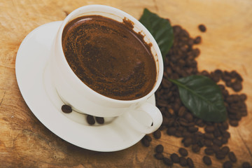 Coffee cup and beans