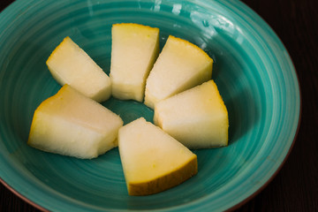 Slices of juicy melon on a plate
