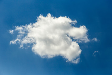 White single cloud on blue sky