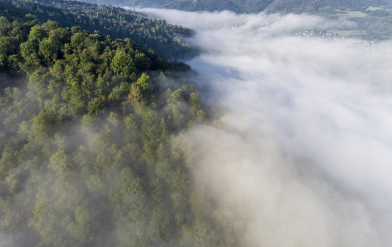 Fototapeta Landscape misty panorama. Fantastic dreamy sunrise on rocky moun