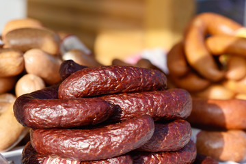 Fototapeta premium Smoked sausage is homemade on the trade counter