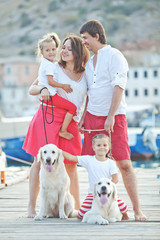 Family and dog resting outdoors 