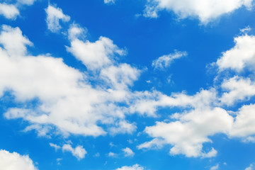 Naklejka na ściany i meble Sky and clouds. White fluffy cumuli clouds in the blue sky.