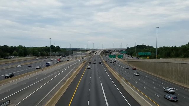 Large Highway With Many Cars Going By