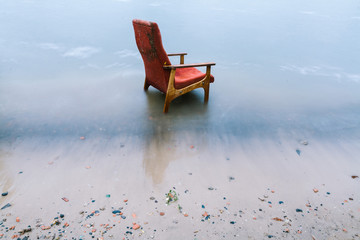 vintage chair on the seashore.