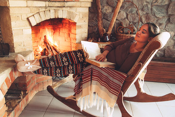 By the fireplace