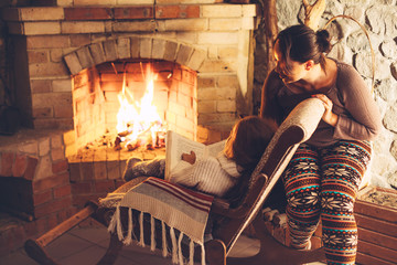 By the fireplace