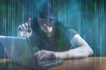 Young hacker in digital security concept