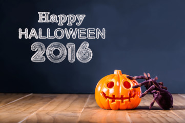 Happy Halloween 2016 message with pumpkin and spider