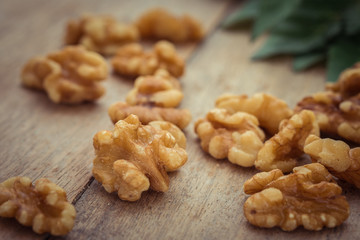 Walnut kernels on wooden table