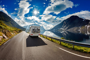 Caravan car travels on the highway. - 120403499