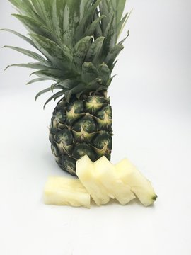 ripe whole pineapple isolated on white background