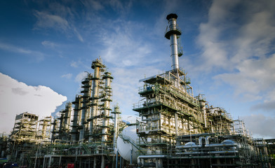 petrochemical plant column tower at twilight