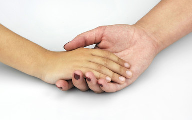 Child and mother hands on light background
