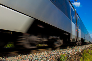 Obraz premium The movement of a passenger train on the suburbs