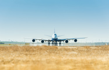 Fototapeta na wymiar Large airplane on the runway ready for takeoff
