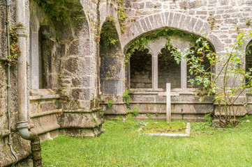 Old grave in an abandoned medieval Abbey