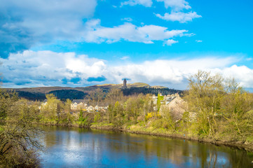 Fototapeta na wymiar River Forth, Stirling (Scotland) and the Wallace monument in the background