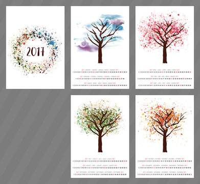 Vector calendar for year 2017 with watercolor tree and copyspace