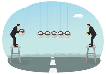 Two businessmen are pushing big balls of the newton's cradle. Team work concept.