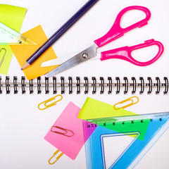 School background with colorful supplies, 