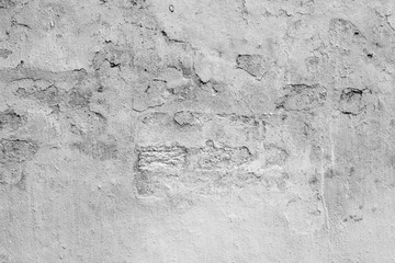 Wall fragment with scratches and cracks