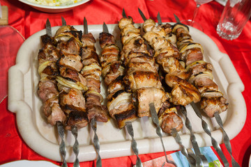 shish kebab on skewers. Skewers of pork and chicken