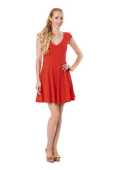 Young beautiful happy blonde woman in red dress