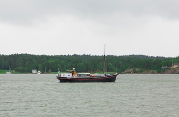 Fototapeta na wymiar Ship in sea