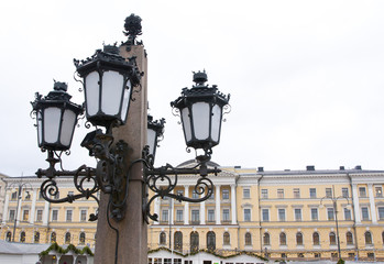 Fototapeta na wymiar Lantern of the monument to Alexander II The Liberator at the Senate Square in Helsinki.