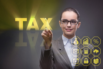 Businesswoman in business tax concept