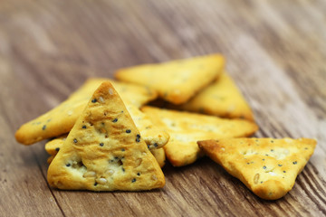 Crunchy poppy seed and sesame seeds snacks, closeup
