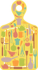 Naklejka premium various cooking utensils on a cutting board