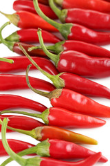 Red chili peppers on a white background